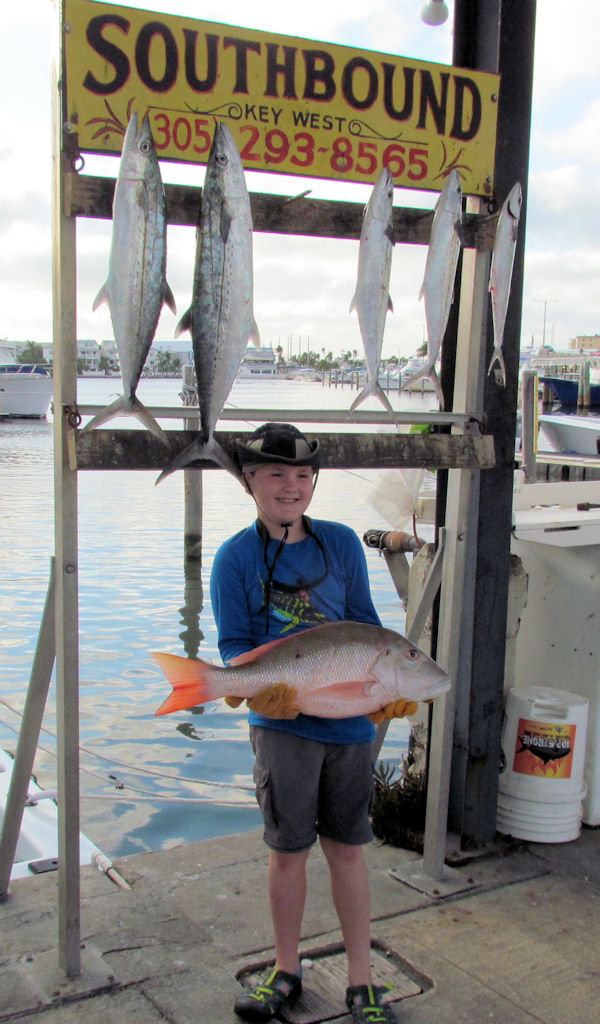 Little guy and Big Mutton Snapper caught in Key West fishing on Key West Charter boat Southbound