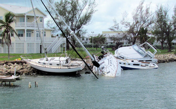 Beached sailboats in No wake zone in Key West on the way out fishing with charter boat Southbound