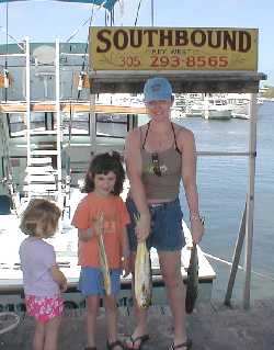 Little folks with little dolphin in Key West