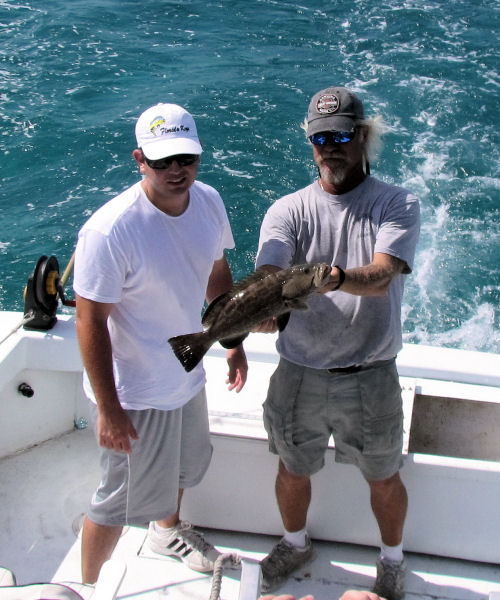 Small Grouper caught and released in Key West fishing on Key West charter boat Southbound from Charter Boat Row