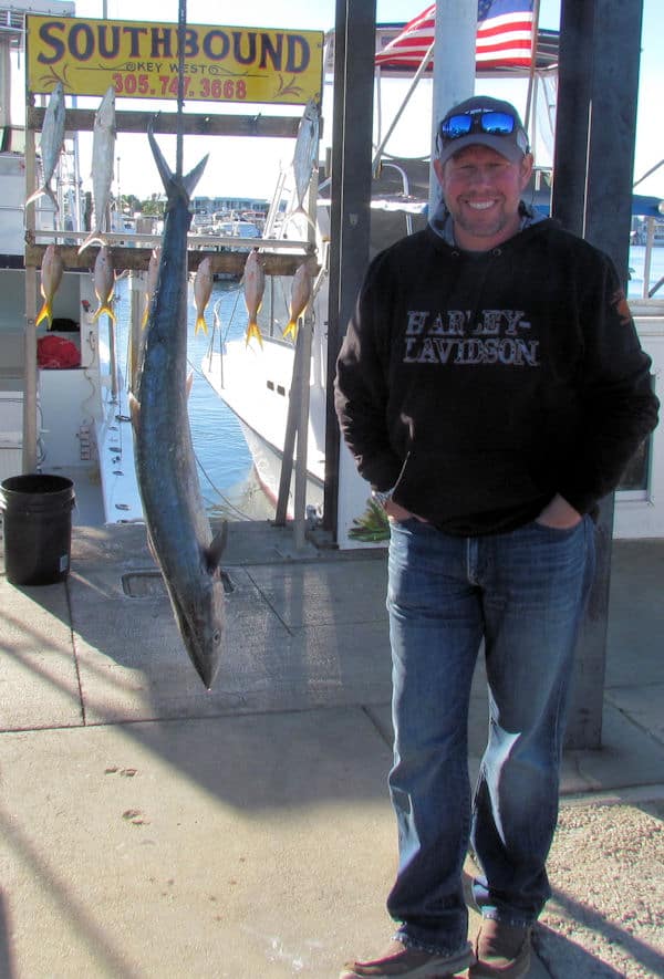 24 lb Kingfish caught on 20 lb spinning tackle in Key West fishing on charter boat Southbound